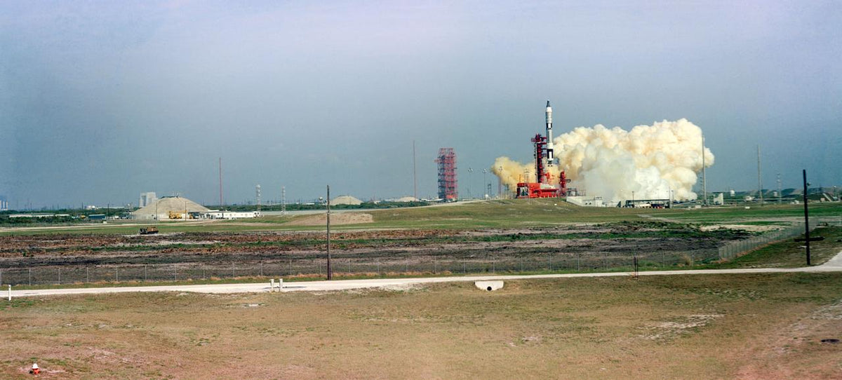 Distant view of the Gemini-Titan 3 rocket lifting off from Cape Kennedy, 23 March 1965