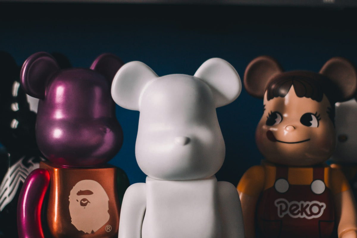 Designer toy figures on a shelf